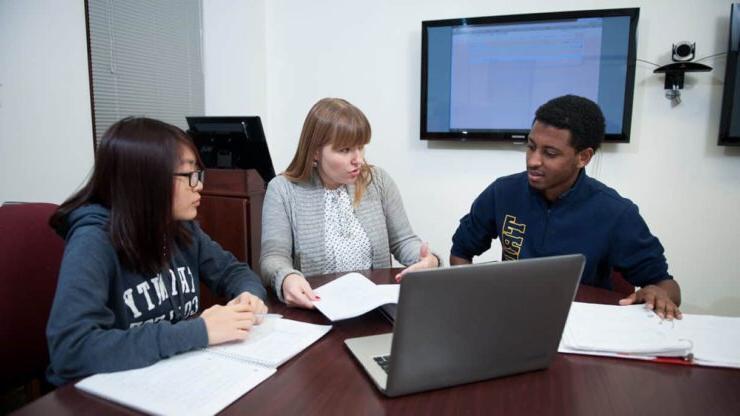 Associate Professor of Computer Science Ewa Syta works with students. 